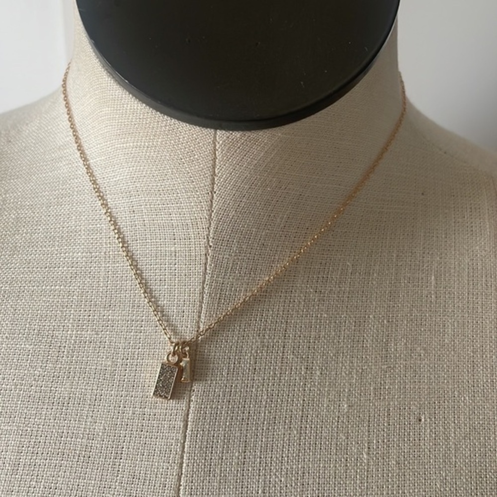 A new day necklace goldtone charm fashion jewelry New